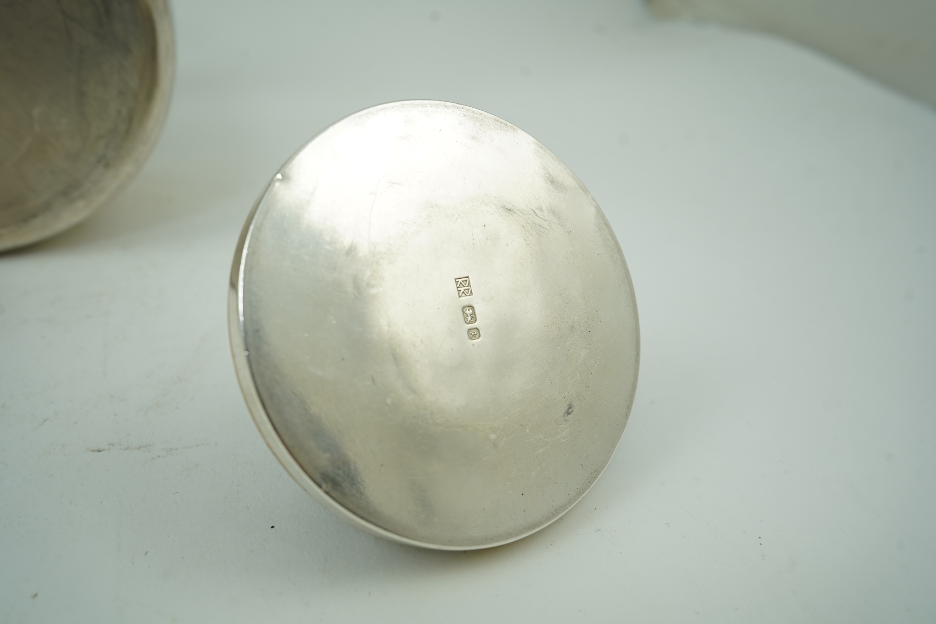 Roy Ridsdale (1942-2020): A silver tea kettle and matching cream jug